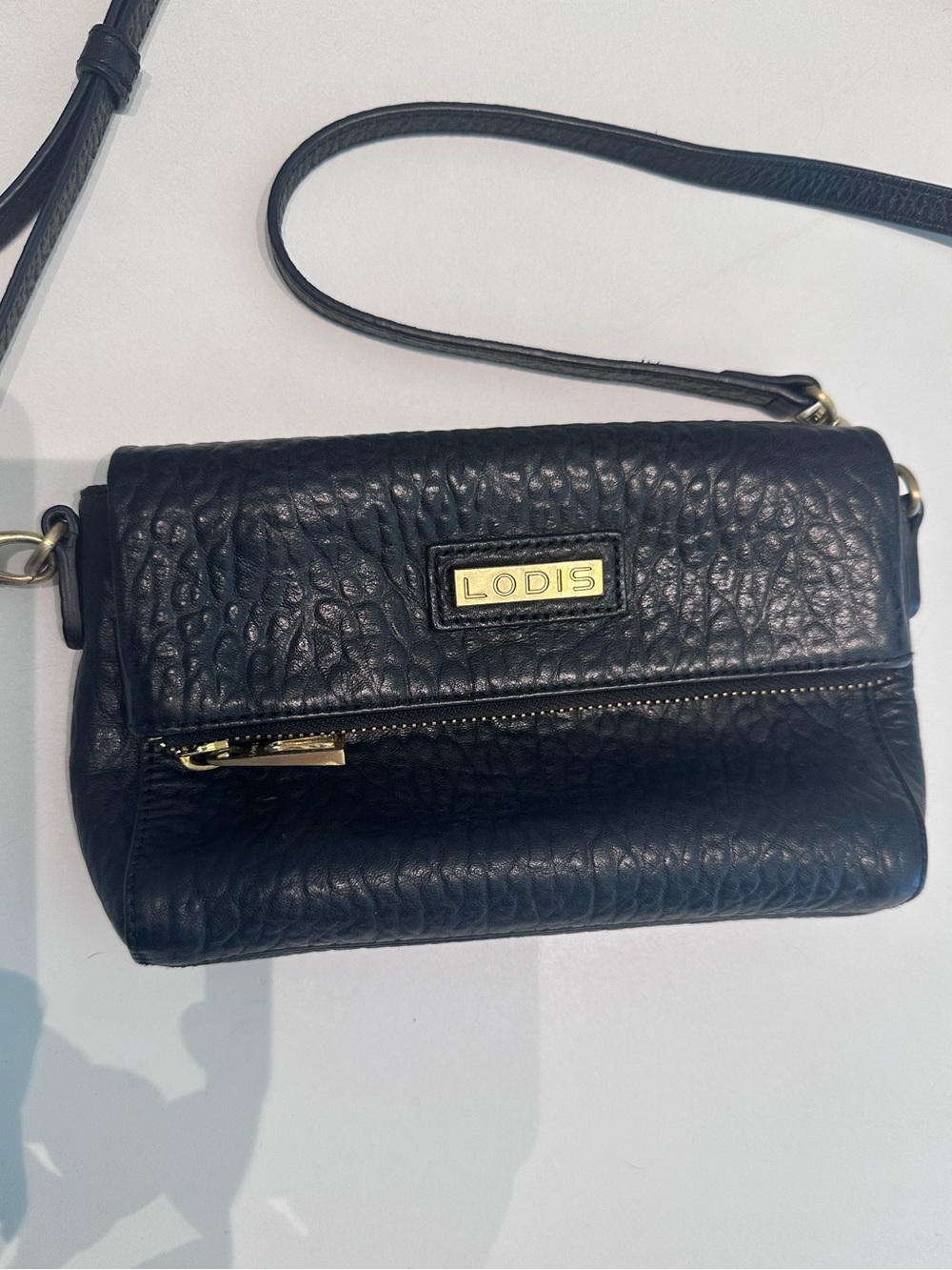 Lodis black pebbled leather crossbody bag